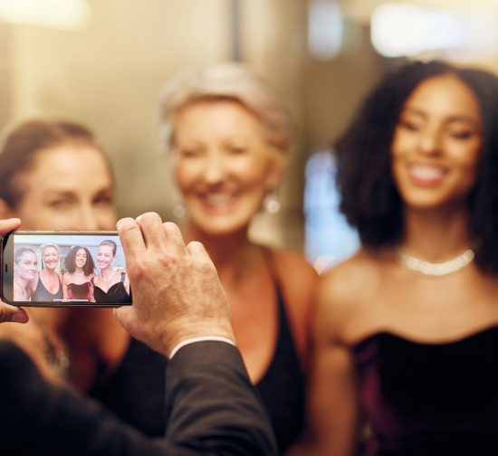 Event photography / Phone, photography or women in a party in celebration of goals or new year at fancy luxury event. | Guests capturing moments at an event using Nalu Moments photo sharing platform